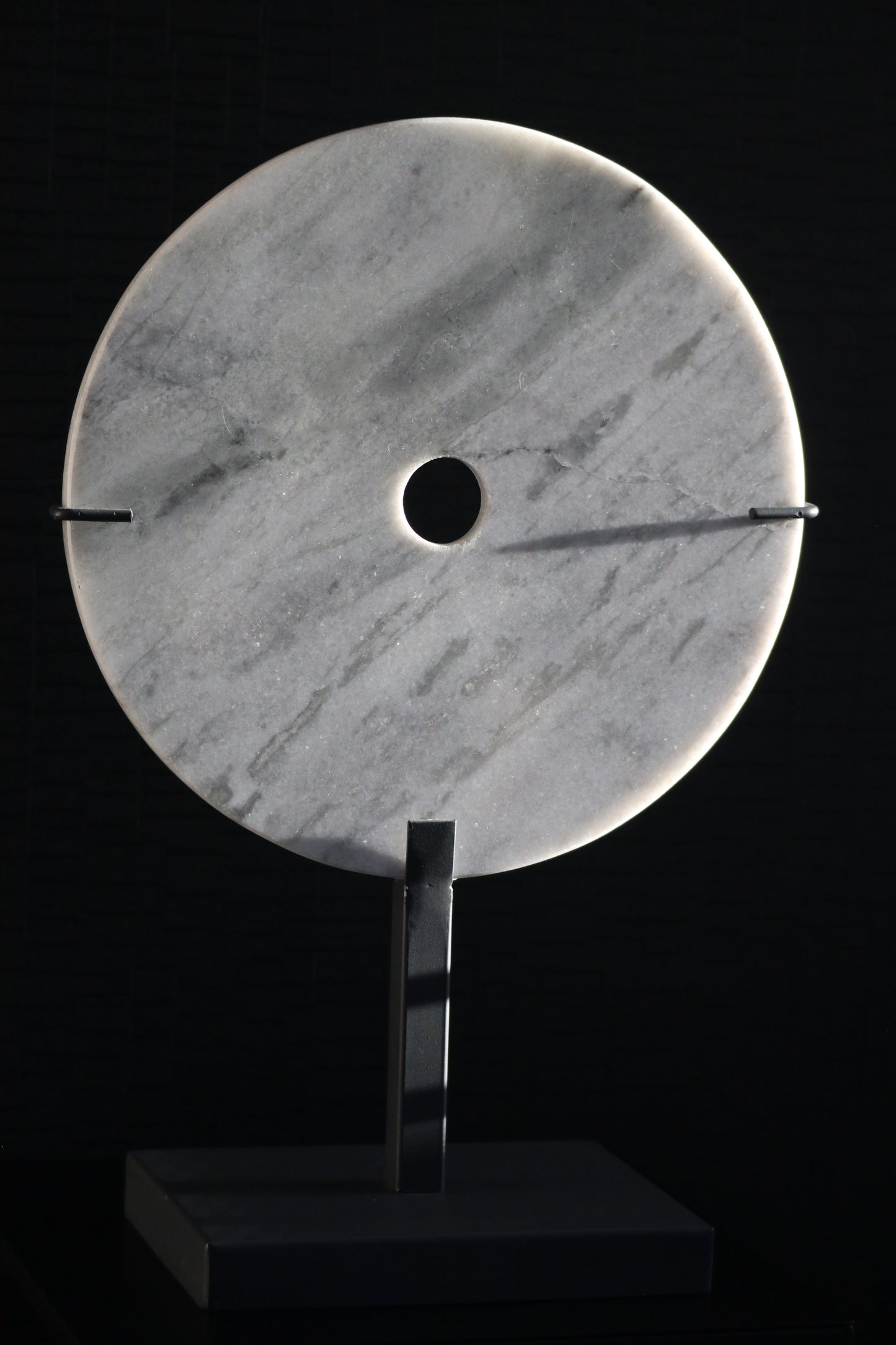 Marble ornament on metal base